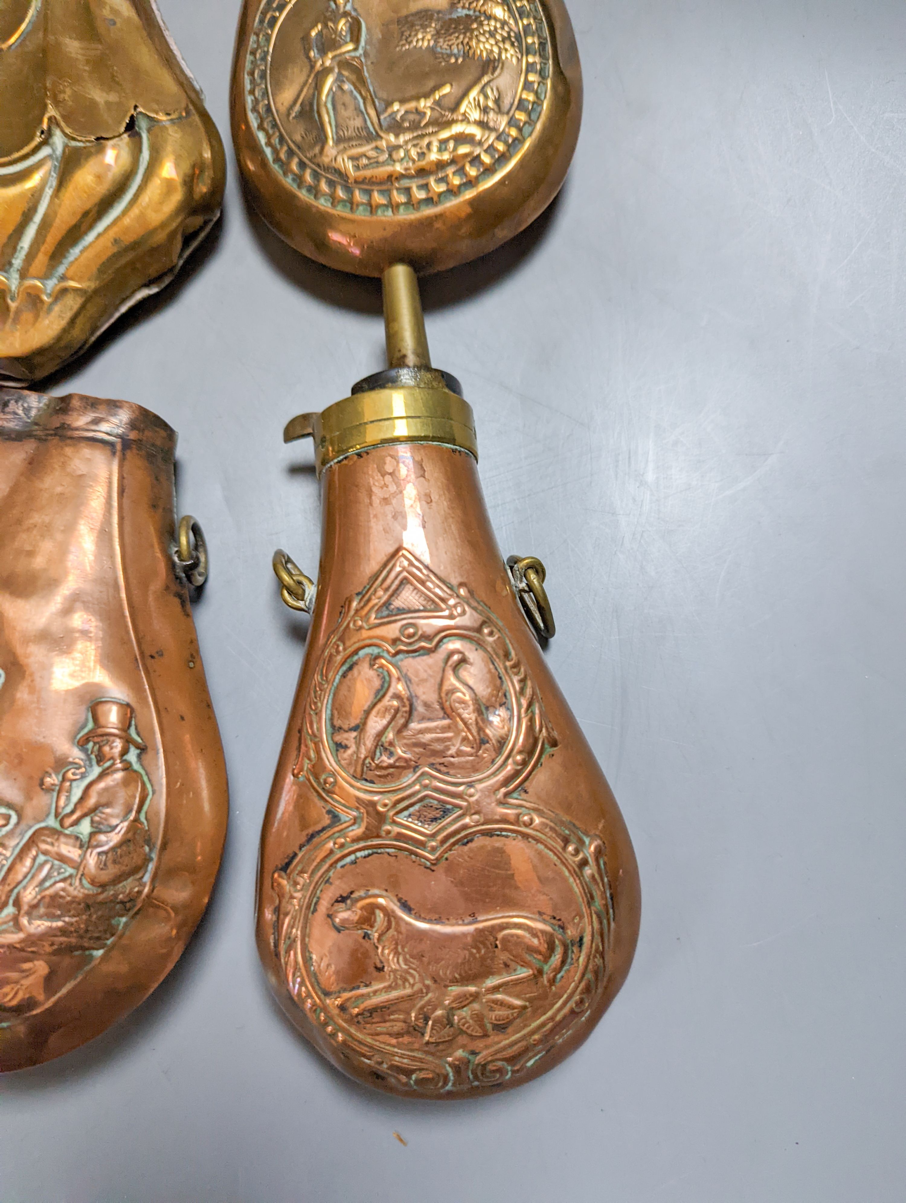 Eight assorted 19th century copper shot flasks